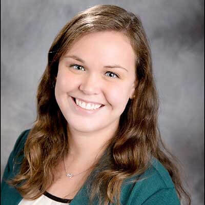 Women smiling at camera for professional headshot